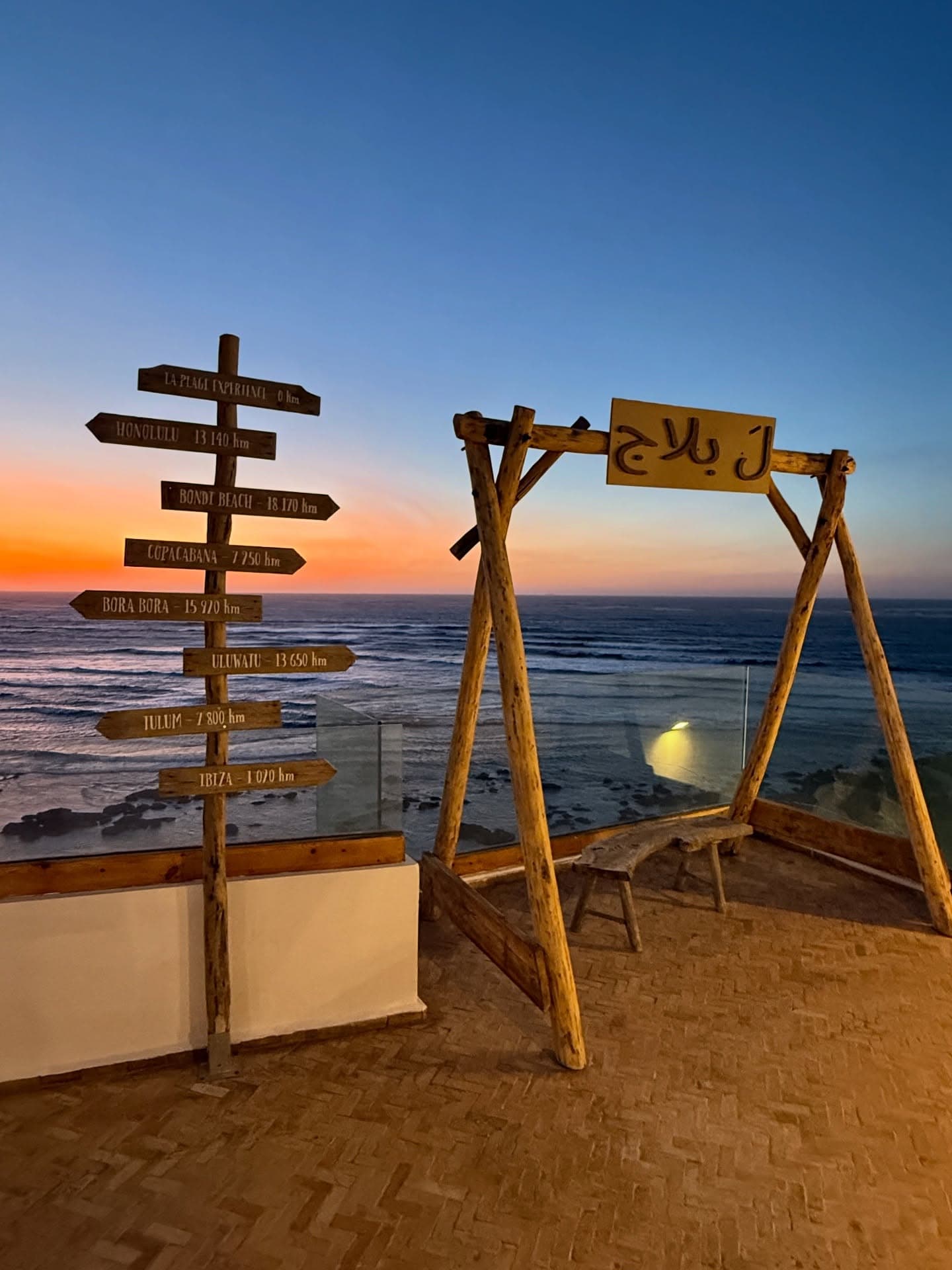 Sunset swing and signpost